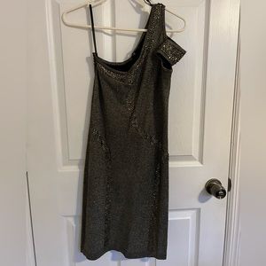 Glitter dress with details in sequins and stones